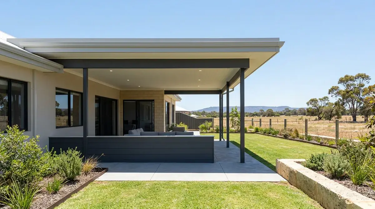 Flat-roof patio on a Whitby estate lot at Byford, open paddock beyond the low back fence and the Darling Scarp on the eastern horizon