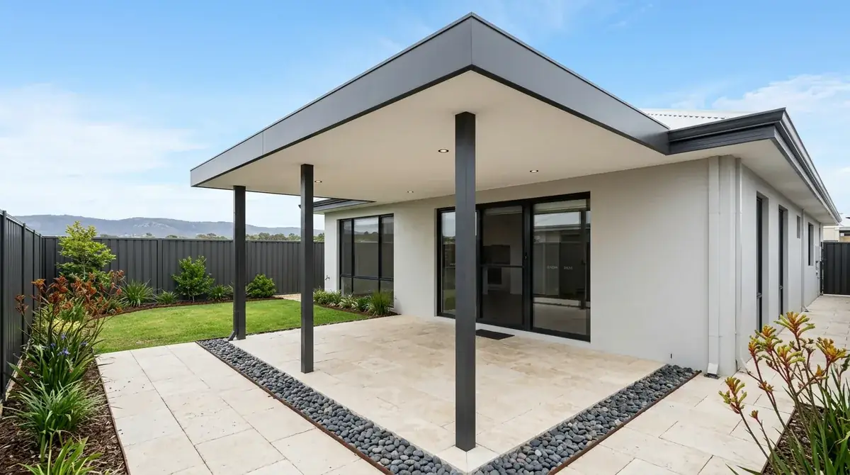 Flat-roof patio with an insulated panel ceiling and flush downlights over a courtyard on a newer High Wycombe lot, low estate fencing and the Darling Scarp rising to the east