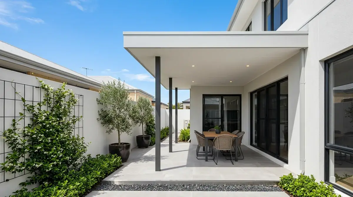 A flat roof patio over a walled inner-city courtyard in Perth, the horizontal roof plane sitting just under the top of the surrounding wall