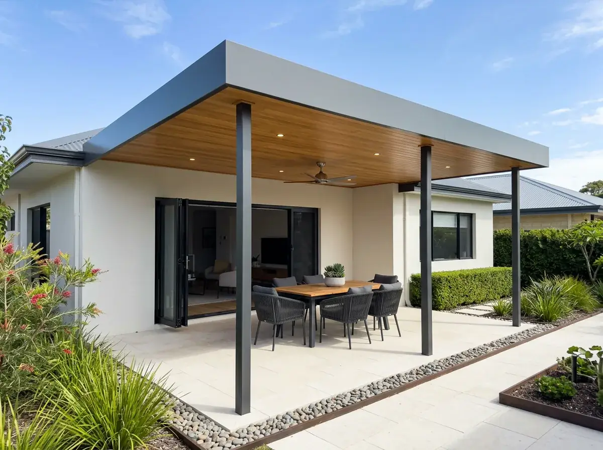 A newly finished flat roof patio on a rendered Perth home, crisp level roofline and timber lined ceiling over a freshly paved alfresco